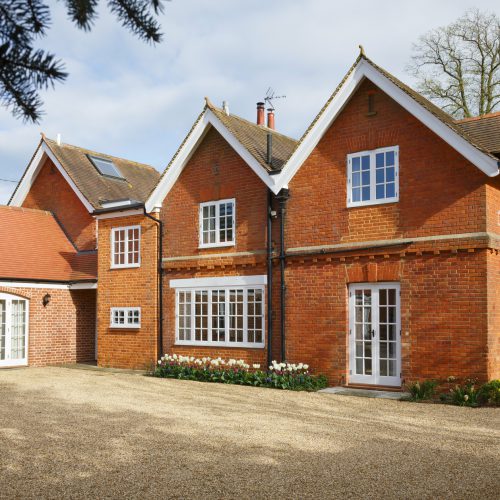 Victorian coach house and stables with courtyard. England, UK